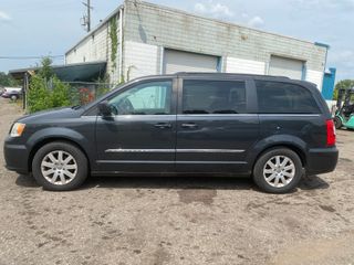 2011 Chrysler Town & Country Touring-L - Exterior Side Driver Image